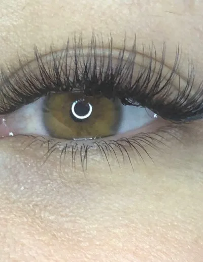 Zoomed photo of an eye showing eyelash extensions example 18 from Aesthetically Speaking in Reno, Nevada.