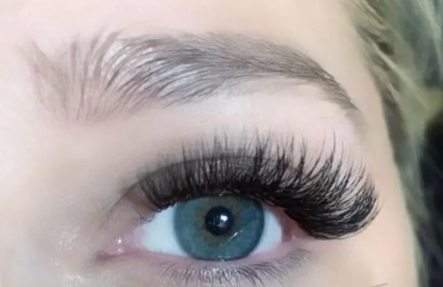 Zoomed photo of an eye showing eyelash extensions example 7 from Aesthetically Speaking in Reno, Nevada.
